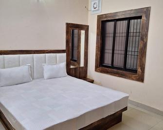 Sai Resort - פורי - חדר שינה