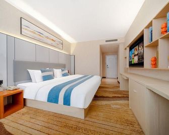 Chaoyang International Hotel (Dongtai Yaoban Branch) - Yancheng - Slaapkamer