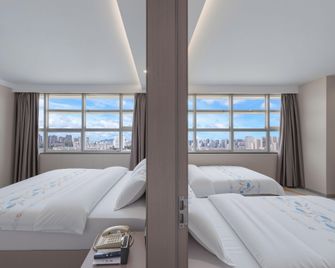 Artwell International Hotel - Rizhao - Slaapkamer