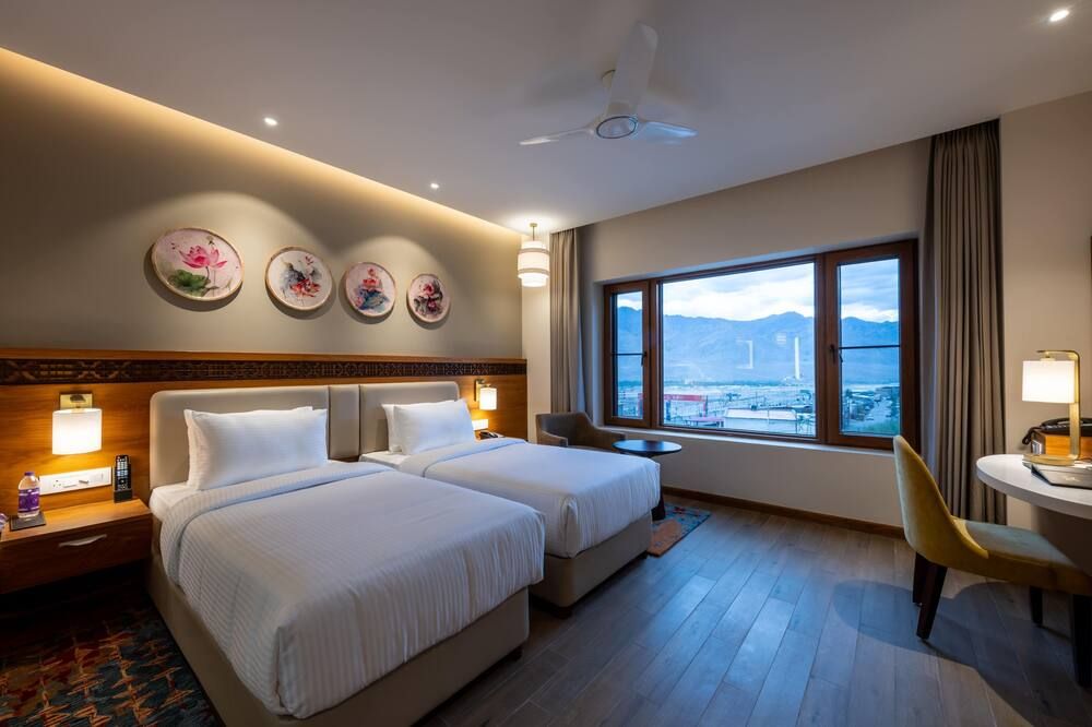 Charmwood Hotel - לה - חדר שינה