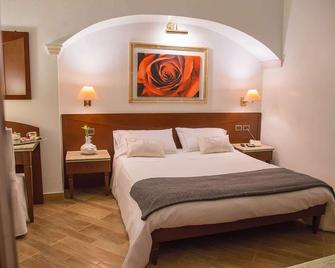 Palmed Hotel - Gizzeria - Schlafzimmer