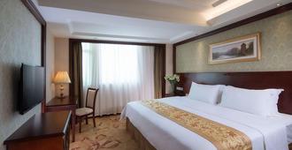 Vienna Hotel Shenzhen Xintian - Shenzhen - Schlafzimmer