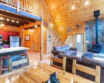 Waterfall Hideaway-Spacious Streamside Cabin in Lake Community w/Hot Tub & Kayak! - Tuckasegee - Living room