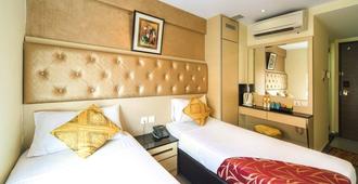 Sandpiper Hotel - Singapur - Habitación