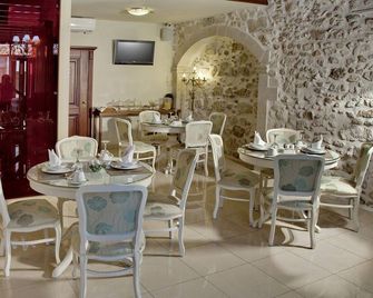 Antica Dimora Suites - เรทิมมอน - ร้านอาหาร