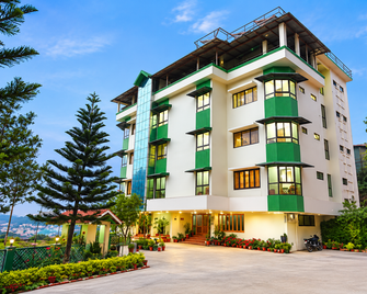 Goroomgo Poopada Resort Kerala - Munnar - Building