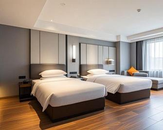 Bonny International Hotel - Shaoyang - Bedroom