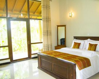 serenity sigiri resort - סיגיריאה - חדר שינה