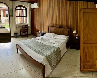 Pousada Finlandia - Penedo - חדר שינה