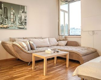 Shared 2BR Residence by Millennium Tower - 維也納 - 客廳