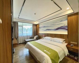 Shell Ganzhou Longnan District Longxiang International Lingxiu Court Hotel - Ganzhou - Спальня