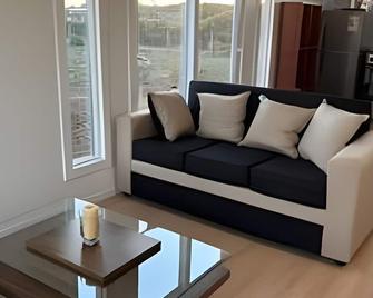 Lindas y acogedoras cabañas en puerto varas. - Puerto Varas - Wohnzimmer