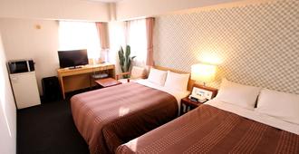 Hotel Livemax Budget Chitose - Chitose - Phòng ngủ