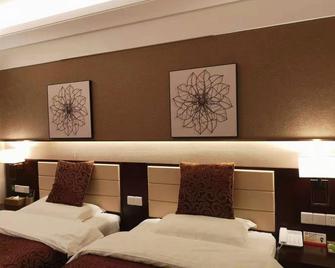 هونجلويان نينجشانج جراند هوتل - شنغهاي - غرفة نوم