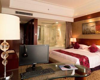 Xiangcheng International Hotel - Chongzuo - Bedroom
