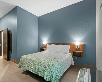 HomeTowne Studios by Red Roof Bradenton - בריידנטון - חדר שינה