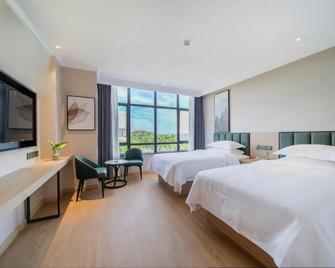Greentree Inn Chizhou Pingtian Lake Qingfeng Avenue Business Hotel - Chizhou - Bedroom