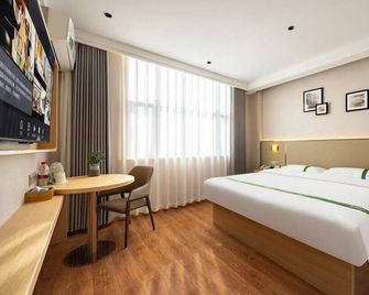 Greentree Sunshine 100 Express Hotel - تيانجين - غرفة نوم
