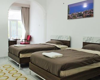 Tiwi Sunrise - Tiwi - Habitación