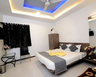 Hotel Vyankatesh & Pure Veg Restaurant - Mahabaleshwar - Κρεβατοκάμαρα