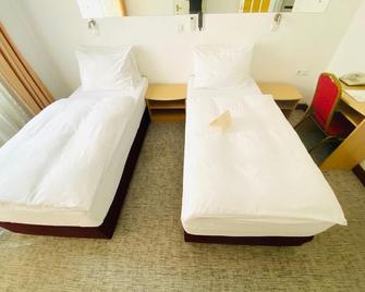Hotel Slavonija - Vinkovci - Schlafzimmer