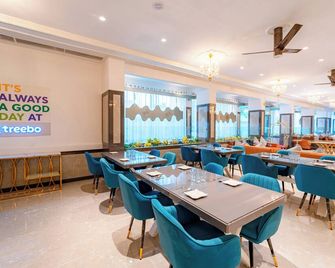 Treebo Premium Omni Residency - Indore - Restaurante