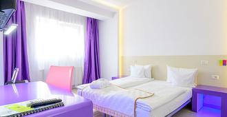 Hotel Christina Plus - Bukarest - Schlafzimmer