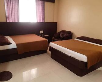 Hotel Krishna Sai Kutir - Shirdi - Slaapkamer