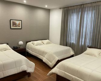 Alston Inn Hotel - Κίτο - Κρεβατοκάμαρα