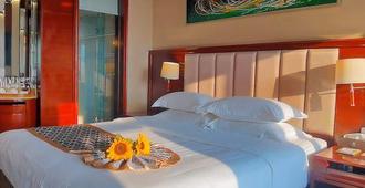 Tianyi East Ring Hotel (East High-speed Railway Station) - Haikou - Schlafzimmer