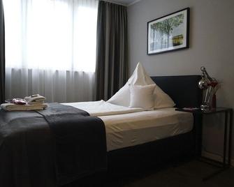 Boutique Hotel am Markt - Melle - Спальня