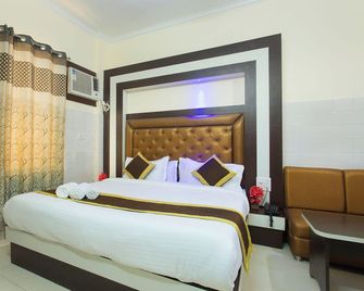Hotel Global Inn by Quality Inn - Nové Dillí - Ložnice