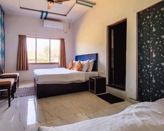 Rudraksha Inn - Mount Abu - Slaapkamer