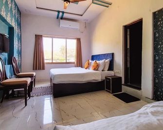 Rudraksha Inn - Mount Abu - Schlafzimmer