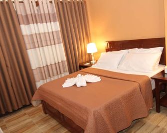 Charos Dormitel - Dumaguete City - Bedroom