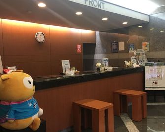 Hotel Route-Inn Tosu Ekimae - Tosu - Front desk