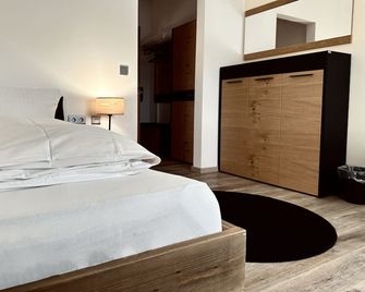 E&D Hotel - Rodgau - Schlafzimmer