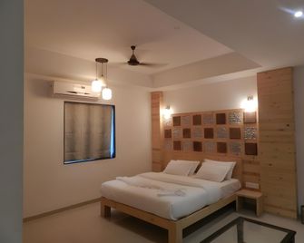 Hotel Stonarc - Chākan - Bedroom
