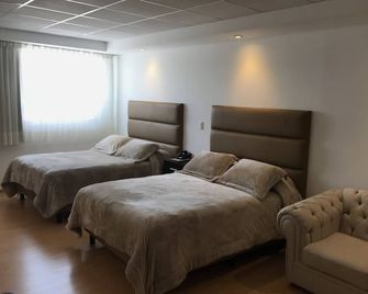 My Home Suites - Celaya - Yatak Odası
