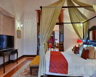 Taj Nadesar Palace - ורנאסי - חדר שינה