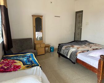 D&D Residency - Mysore - Bedroom