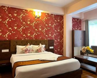 Hotel Little Sikkim Inn - جانجتوك - غرفة نوم