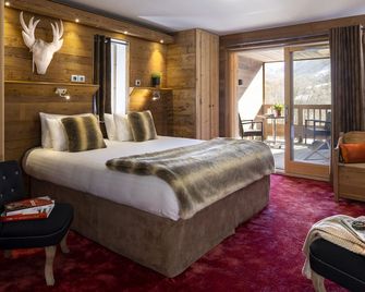 Hôtel Ski Lodge - Chambres & Appartements - Village Montana - Val-d'Isere - Slaapkamer