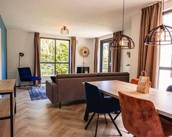 Detached holiday home near Nijmegen - Hernen - Comedor
