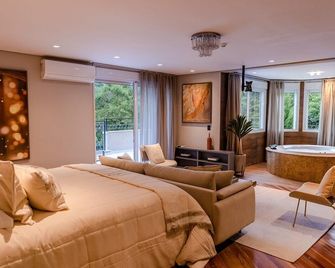 Champet Boutique Hotel - Campos do Jordao - Schlafzimmer