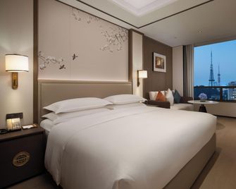 Yuexiu Hotel Guangzhou, Curio Collection by Hilton - Canton - Camera da letto