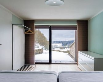 Detached vacation home - luxury & nature with a view (sauna, fireplace, lounge couch) - Holzminden - Camera da letto
