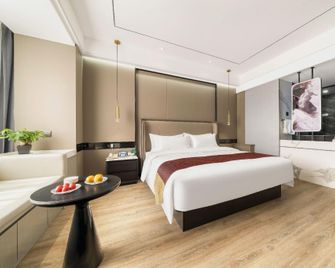 Guangming Hotel - Jiuquan - Slaapkamer