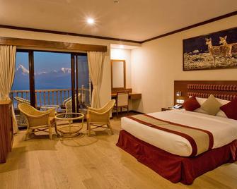 Rupakot Resort - Pokhara - Schlafzimmer