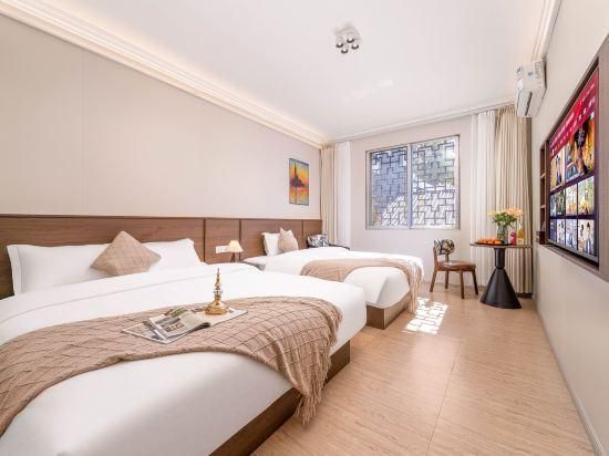 Good Friend Inn (Guilin Maternity and Child Bo'ai Hospital Baoxian Middle School Shop) - Guilin - Living room